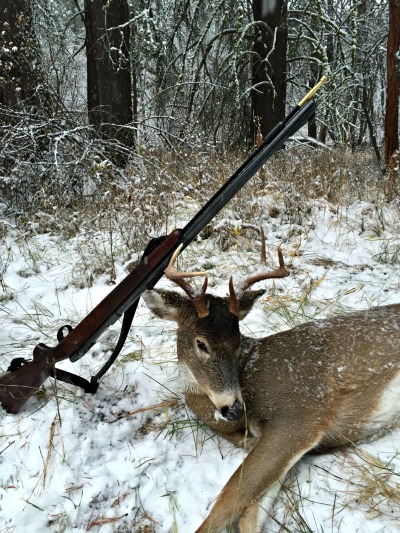 Deer hunting - GLO - 12-19 - Gun on Antlers - optimized.jpg